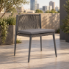 Fotografia e Karrige, emmy, alumin antracite, rattan gri e erret, jasteke gri, 59x60x72cm.